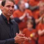 Rafael Nadal receives a historic tribute on the Philippe-Chatrier court at Roland Garros, surrounded by cheering fans and tennis legends.