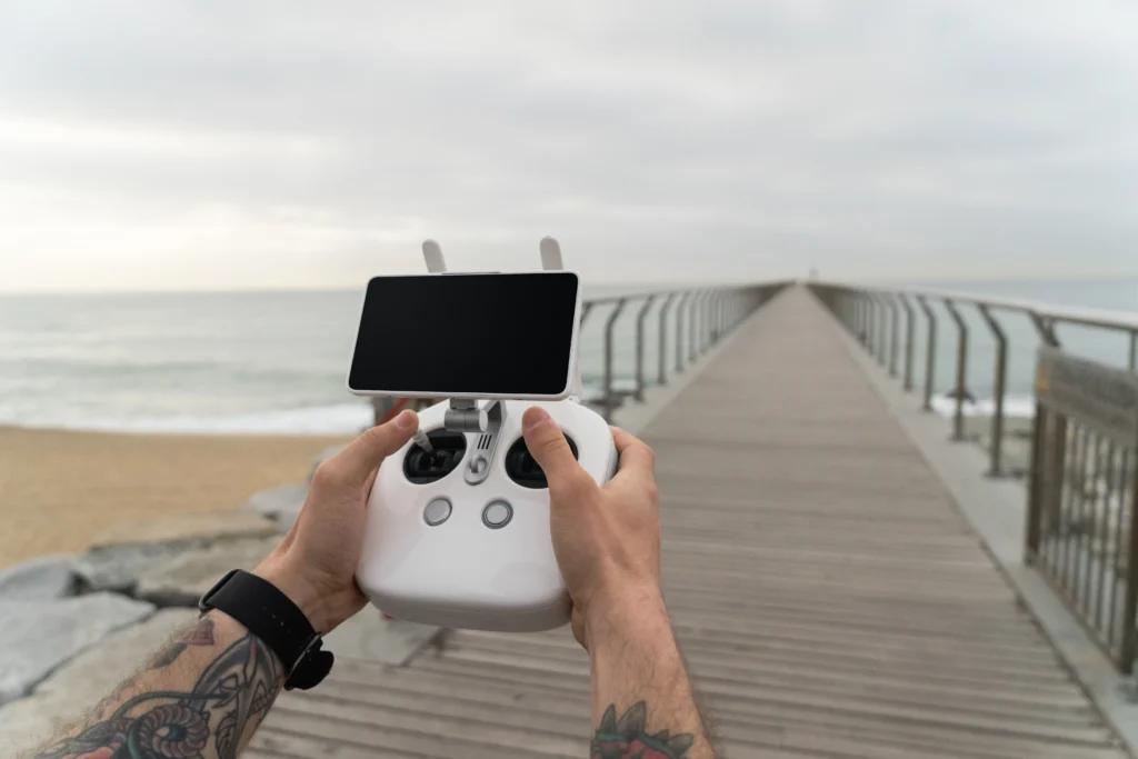 DJI Mavic 4 Pro drone flying in the sky with a scenic background