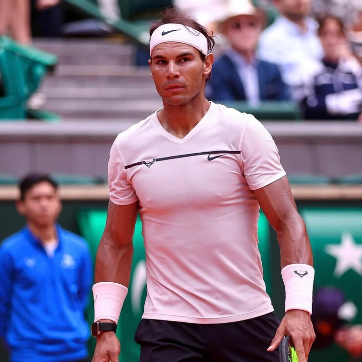 Rafael Nadal receives a historic tribute on the Philippe-Chatrier court at Roland Garros, surrounded by cheering fans and tennis legends.