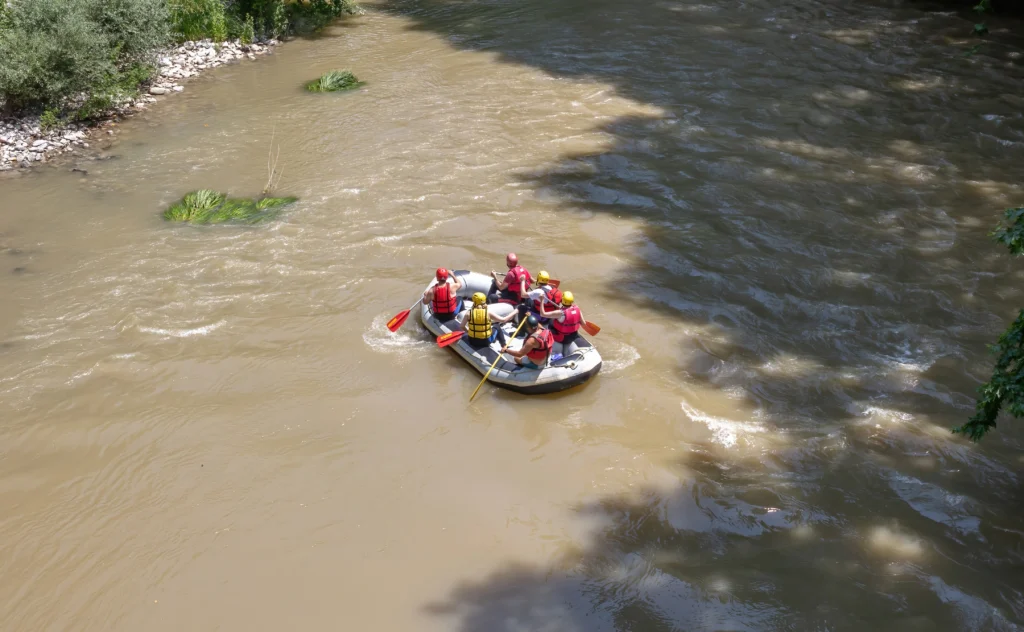 guadalupe river flooding
Flooded street near Guadalupe River with emergency responders assisting evacuees during 2025 flood.