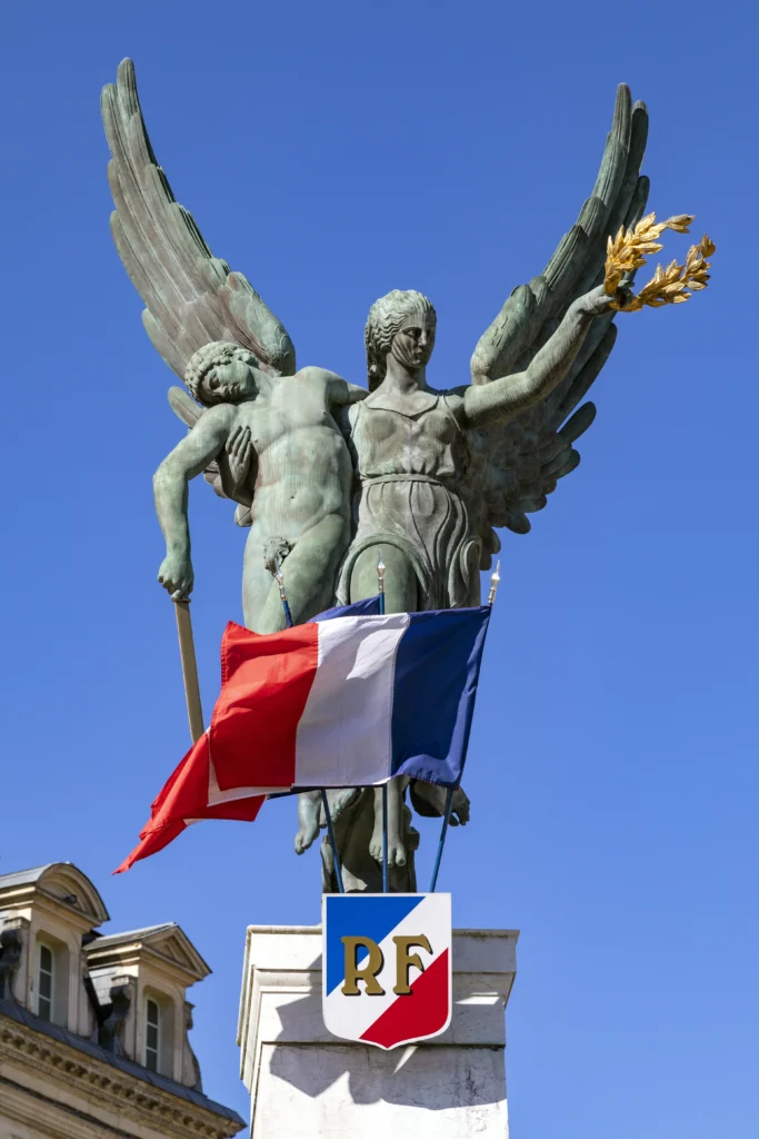 French military parade on the Champs-Élysées during Bastille Day 2025, with soldiers, tanks, and aerial flyovers