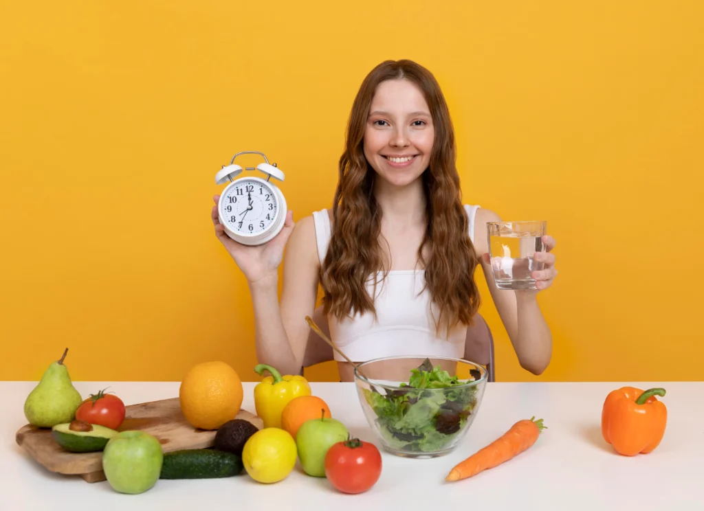 Athlete preparing a healthy meal with protein, carbs, and hydration to illustrate the science behind sports nutrition.