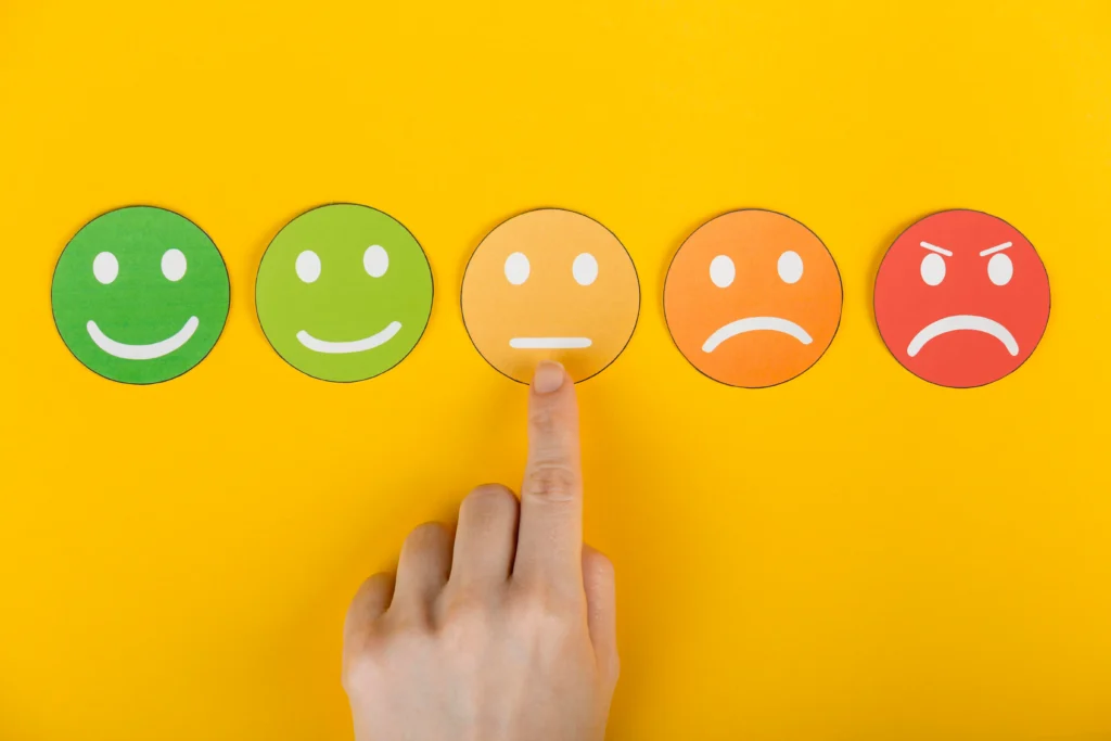 Shoppers walking through a holiday market as consumer sentiment hits new lows during the 2025 holiday season.