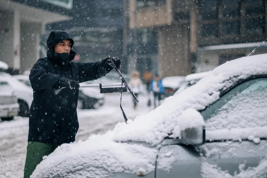 Temporary energy crisis during extreme U.S. cold wave, showing power lines under heavy frost.
