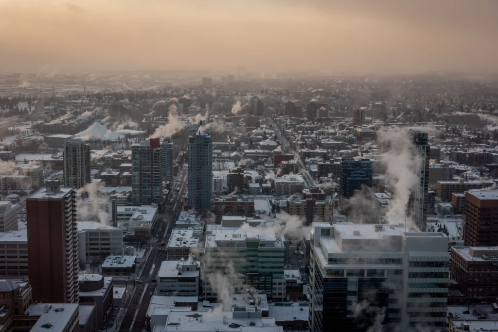Temporary energy crisis during extreme U.S. cold wave, showing power lines under heavy frost.