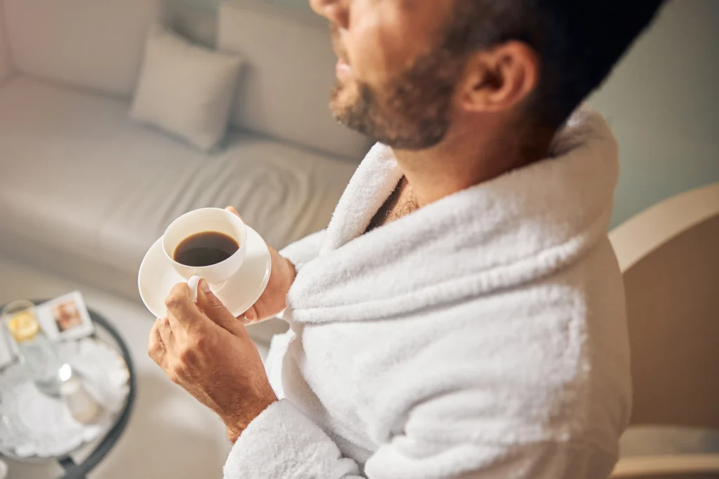 Man practicing self-care to improve mental health, confidence, and well-being while breaking traditional masculinity stereotypes