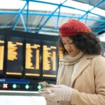 Canceled flight display board at a U.S. airport during a winter storm
