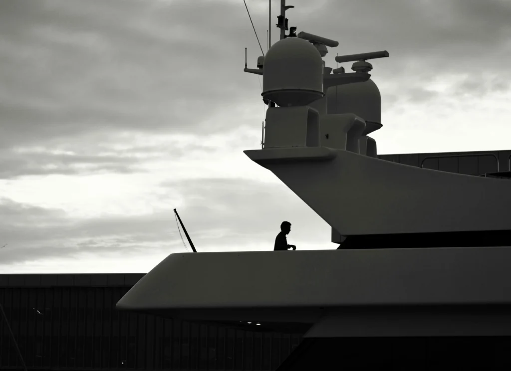Illustration showing miscommunication at Pearl Harbor as military officers review delayed intelligence reports during the surprise attack in 1941