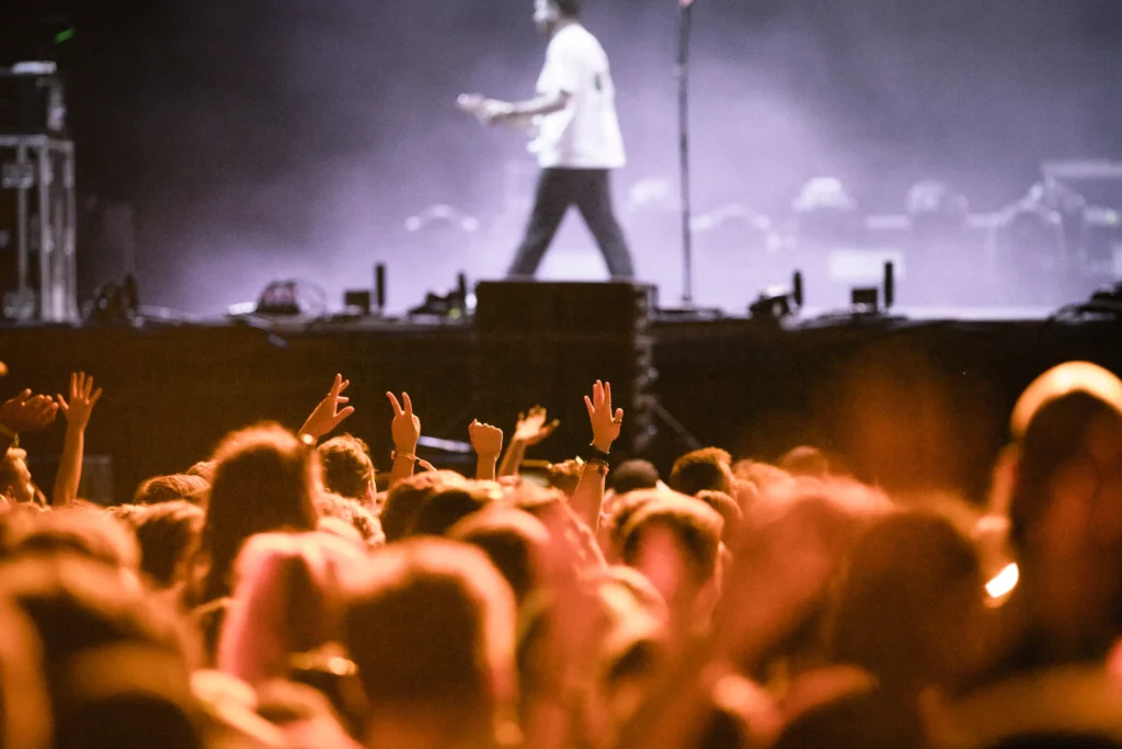 Bruno Mars performing on stage during a high-energy live concert on his global tour