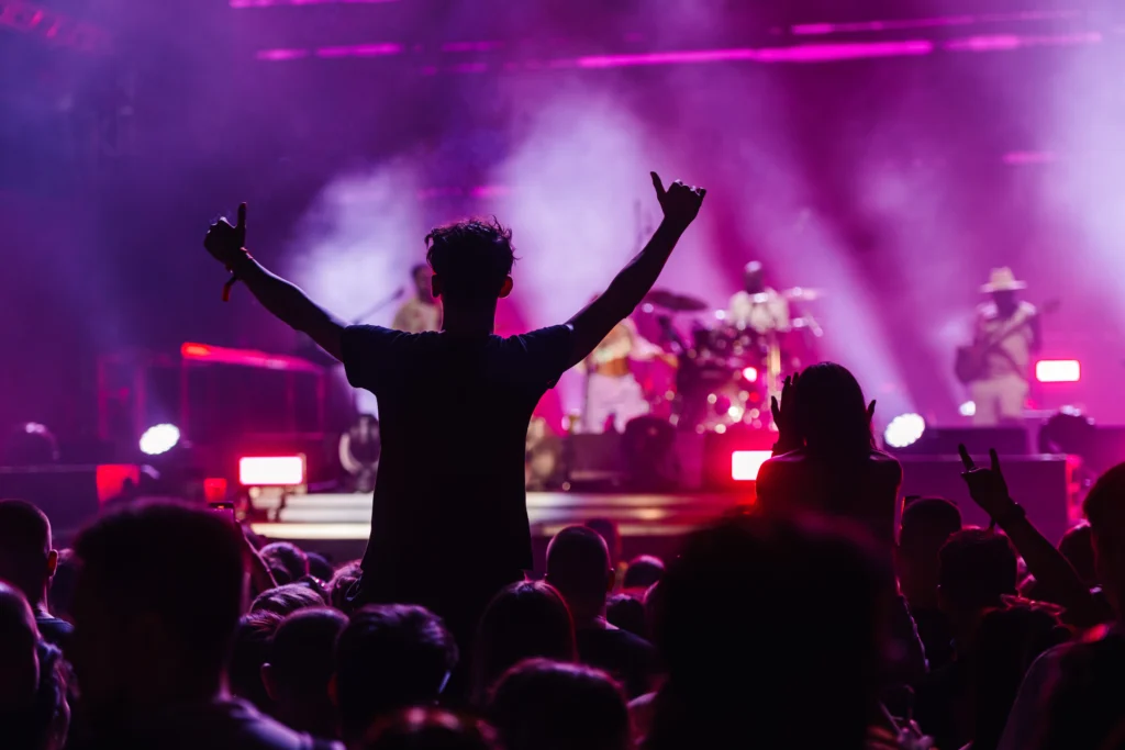 Bruno Mars performing on stage during a high-energy live concert on his global tour