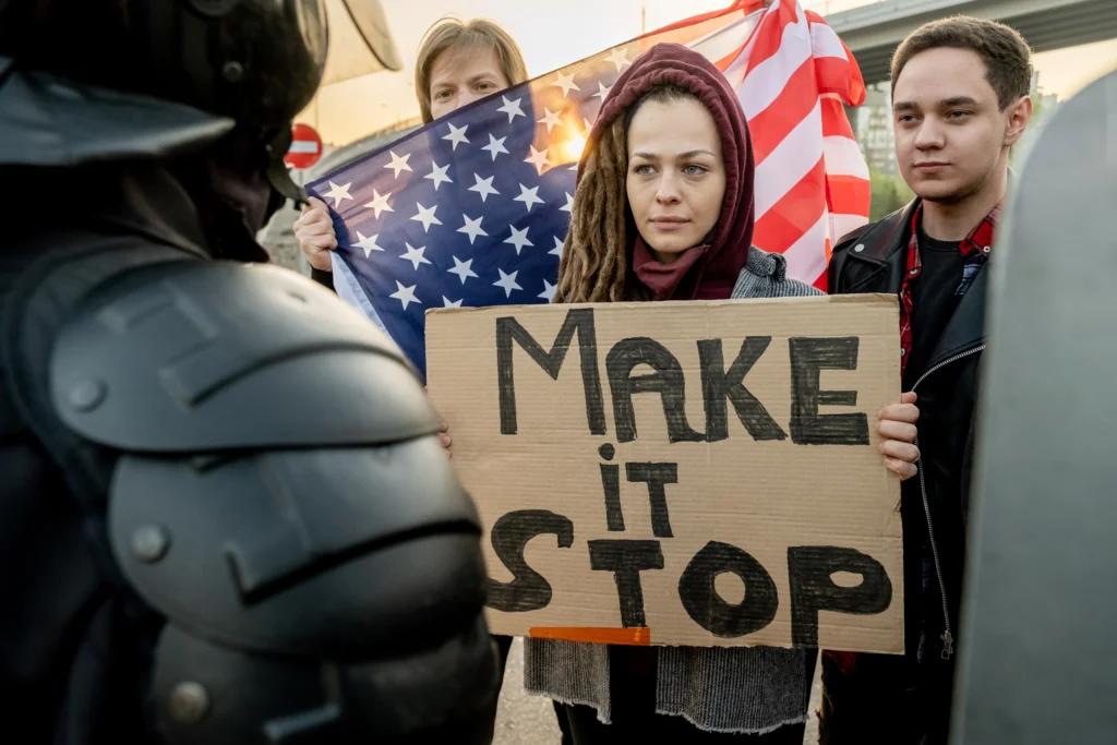 Protests Against ICE
Crowds of protesters holding signs during nationwide rallies against ICE across major U.S. cities