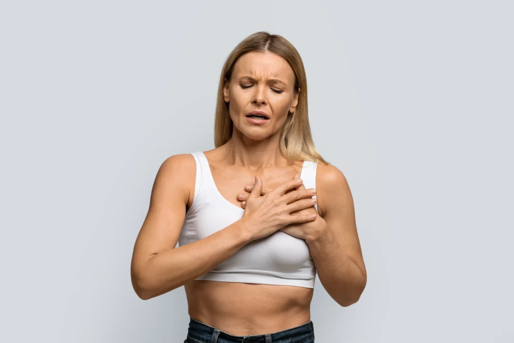 Illustration of pulmonary embolism warning signs, including shortness of breath, chest pain, and swelling in the legs