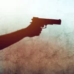 Emergency responders at Old Dominion University during a campus shooting alert, with police vehicles and flashing lights.