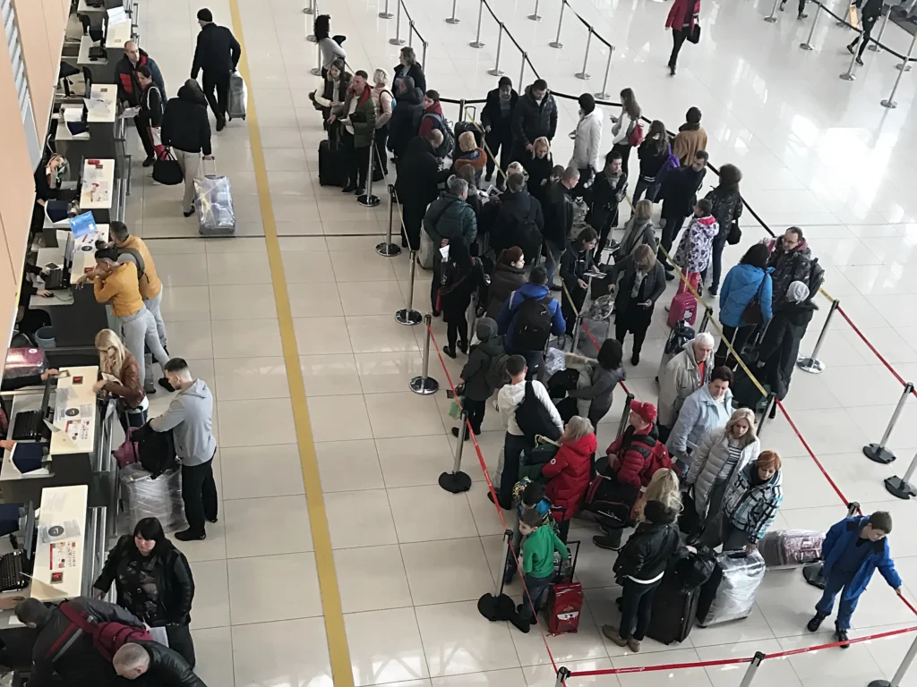 TSA security checkpoint with long lines of travelers at Hartsfield-Jackson Atlanta International Airport