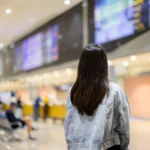 TSA security checkpoint with long lines of travelers at Hartsfield-Jackson Atlanta International Airport