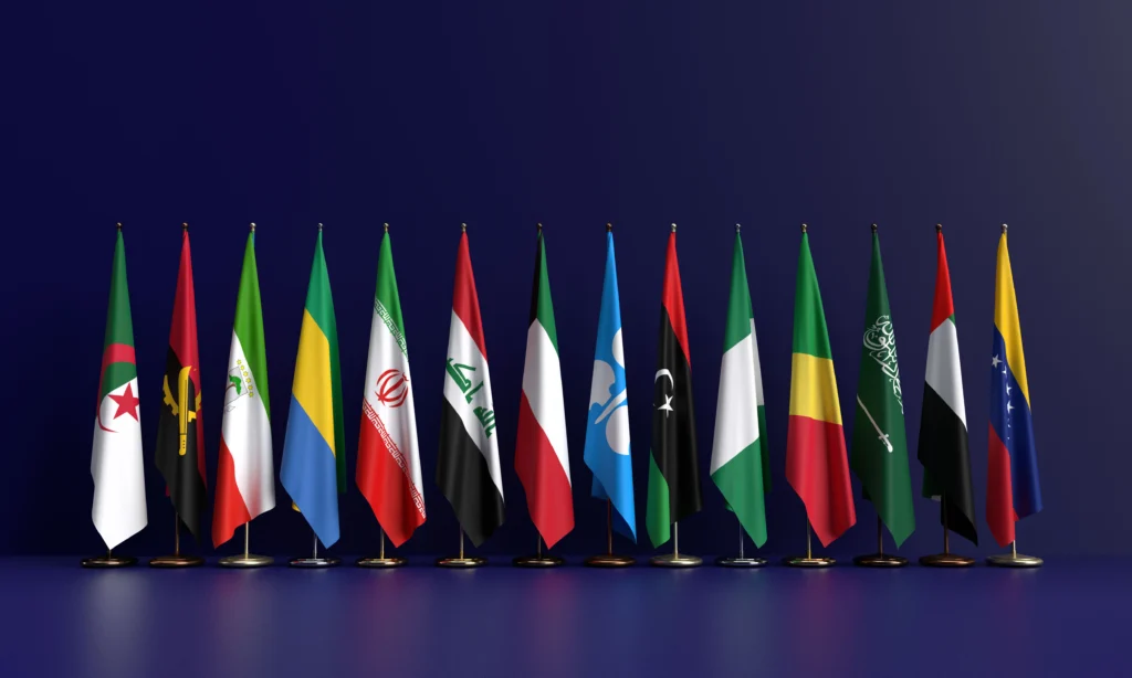 Skyline of the United Arab Emirates with oil rigs, OPEC symbol, and global market charts representing the UAE leaving OPEC and its worldwide economic impact.