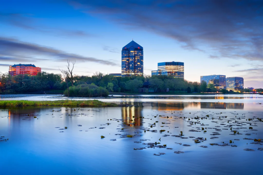 Police and emergency responders at the scene of a shooting in downtown Bloomington, Indiana near the university area at night