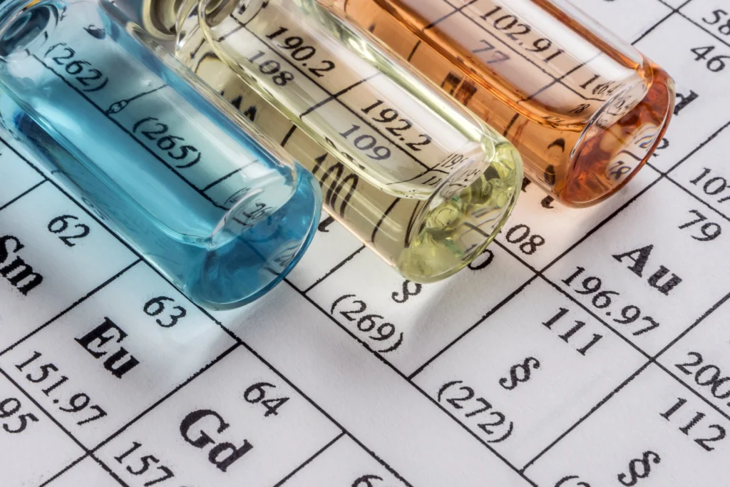 Scientists in a laboratory observing a chemical reaction in glassware representing a 67-year-old chemistry theory finally being confirmed.