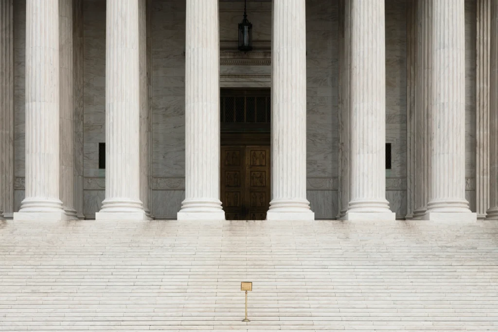 federal
Courtroom gavel beside a symbolic execution chamber representing capital punishment and legal debate