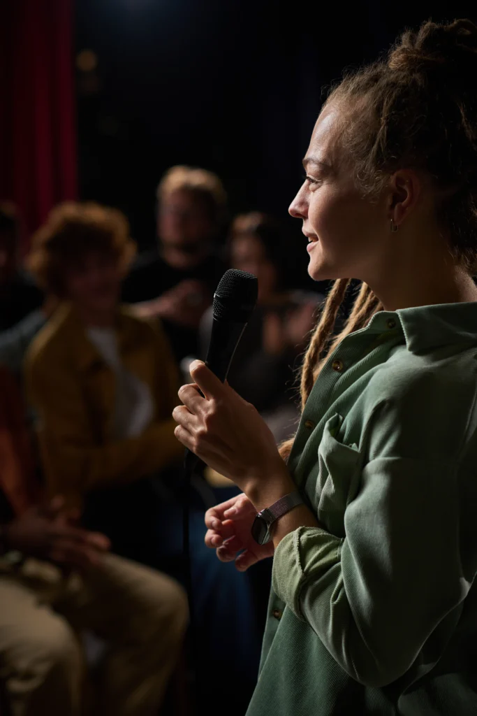 Second City performers reinventing modern comedy on stage in 2026 with a lively audience