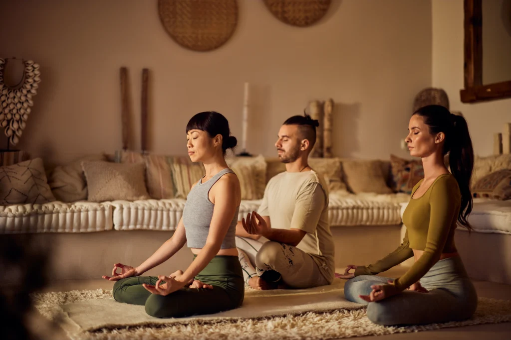 Person practicing simple meditation techniques for beginners in a calm, peaceful indoor setting
