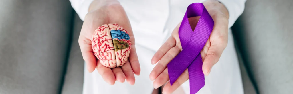 Microscopic view of glioblastoma brain tumor cells with a representation of medical research breakthroughs offering new hope in brain cancer treatment.
