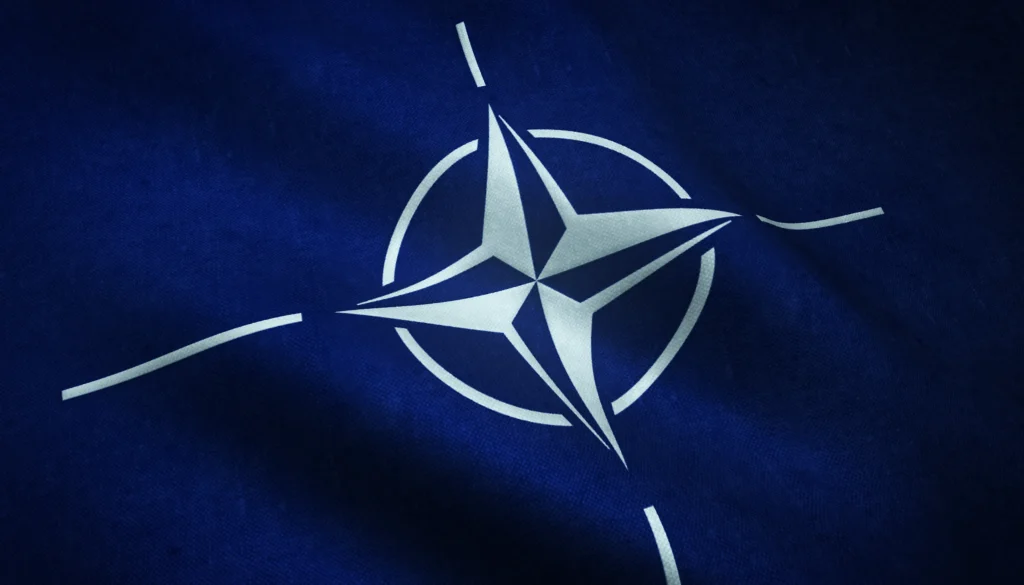 News concept image showing Pentagon building and military movement map related to canceled U.S. troop deployment to Poland.