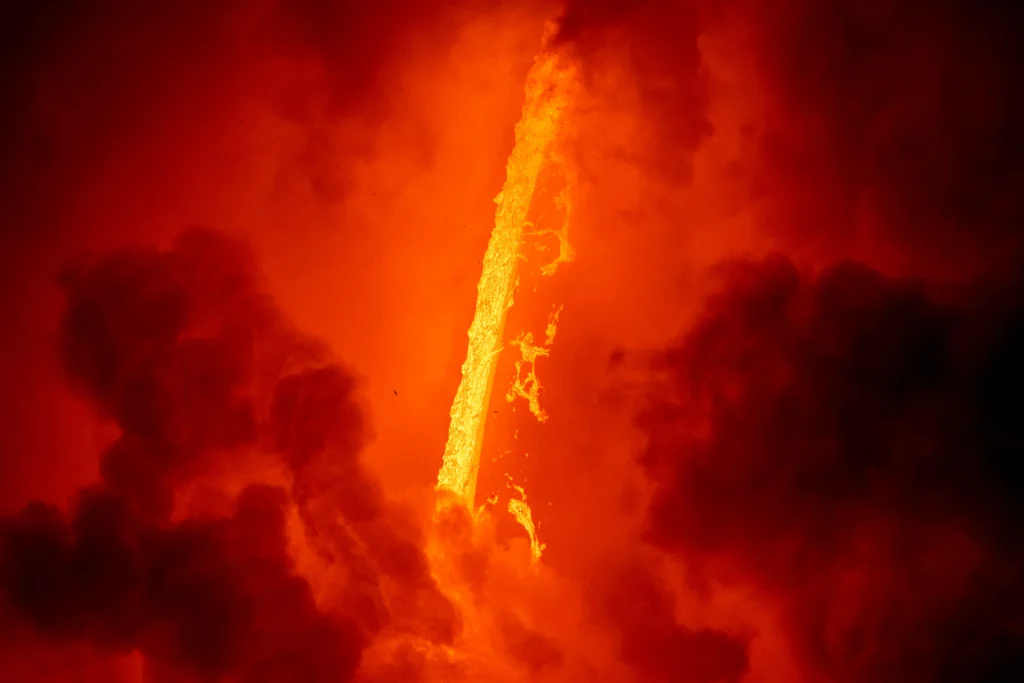 Blue Origin’s New Glenn rocket erupts in a massive fireball during a ground test at Cape Canaveral, sending flames and thick smoke into the sky as engineers investigate the cause of the explosion.