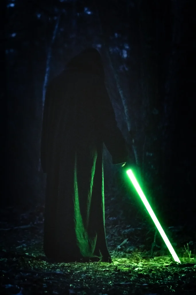 Jedi and Sith facing each other with glowing blue and red lightsabers, symbolizing the clash between light and dark sides of the Force