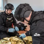 FBI agents investigating a home where a former CIA official was arrested after $40 million in gold bars was discovered.