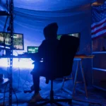 Cybersecurity warning showing a home Wi-Fi router under digital cyber attack threats