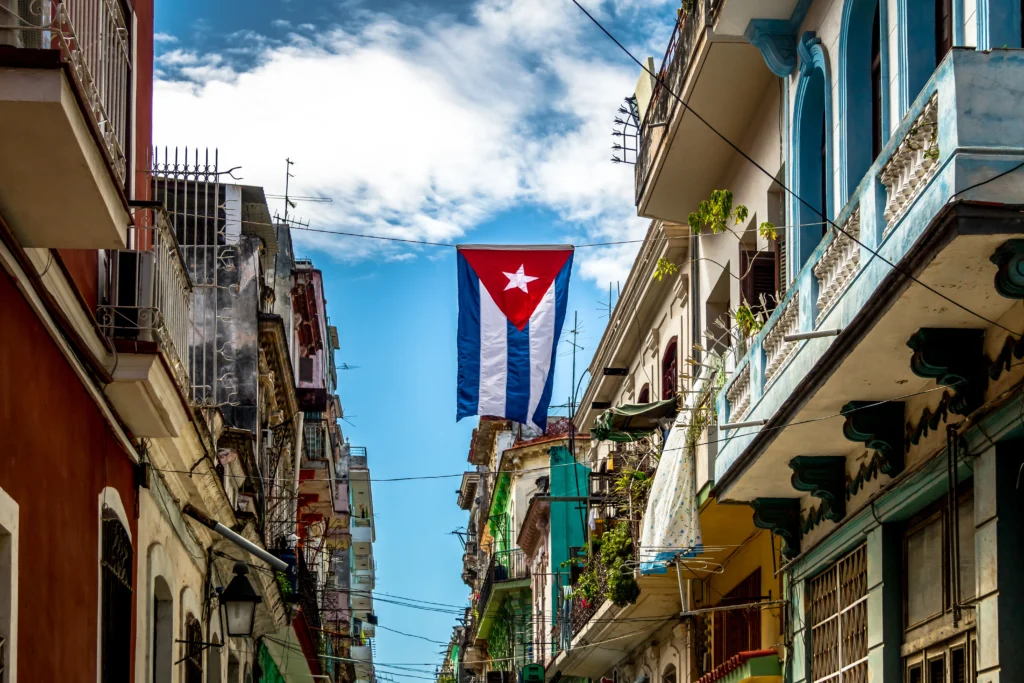 Cuban city street featuring local businesses, market vendors, and entrepreneurs as Cuba embraces free-market reforms, symbolizing a historic shift toward economic liberalization and private enterprise.