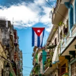 Cuban city street featuring local businesses, market vendors, and entrepreneurs as Cuba embraces free-market reforms, symbolizing a historic shift toward economic liberalization and private enterprise.