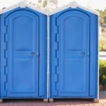 Dead Baby Found in Portable Toilet at Michigan Music Festival: police investigating the scene after the tragic discovery.