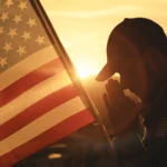Patriot Front members participating in a public demonstration with flags during an organized march in the United States.