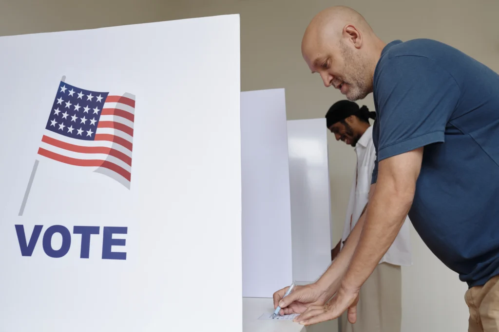 A courtroom with the U.S. Department of Justice seal displayed prominently, alongside voter registration documents and an election map highlighting Virginia and New Mexico, symbolizing the DOJ's 15th consecutive voter roll lawsuit defeat.