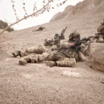 U.S. military personnel secure a military base in Jordan after an Iranian missile and drone attack that left two American troops dead and one missing amid rising Middle East tensions.