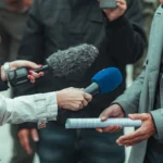Journalist Matthew Cole speaking during an interview as the U.S. Justice Department investigates efforts to identify his confidential sources, raising concerns about press freedom and source protection.