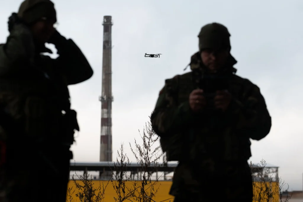 Donald Trump and damaged commercial infrastructure in Ukraine following Russian missile and drone strikes