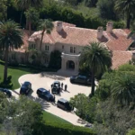 FBI search at a Beverly Hills mansion linked to Stephen Cloobeck in the Eric Swalwell investigation.