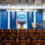 Katie Zacharia, the new White House press secretary, speaking during a political media event
